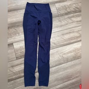 Lulu lemon leggings with pockets & mesh on the bottoms